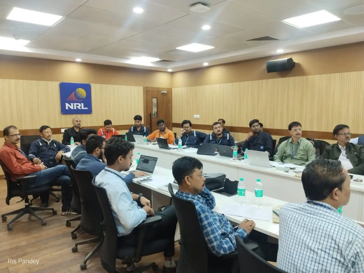 Training session at Numaligarh Refinery Ltd with delegates working on laptops