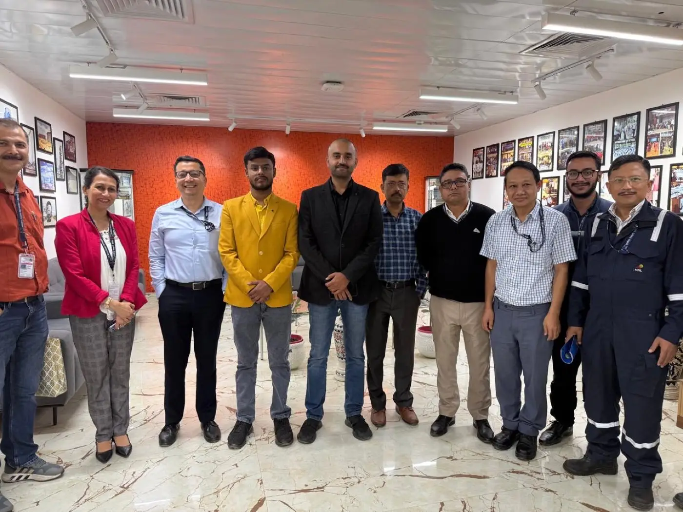 Group photo of QualityNexus consultants with a client team after engagement
