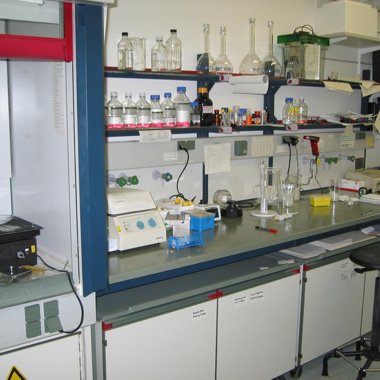 Laboratory bench with reagents and analytical equipment during a NABL accreditation visit